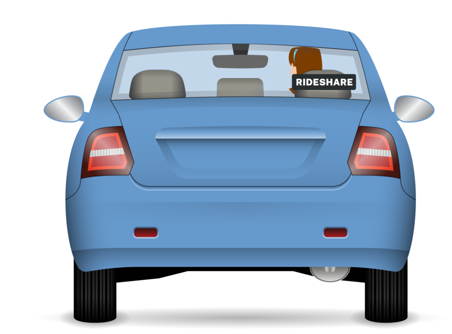 A car showing the rideshare sign being displayed in the rear window