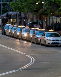 Taxis snaking along the road in Sydney city