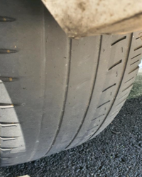 Photo showing bald rear tyre
